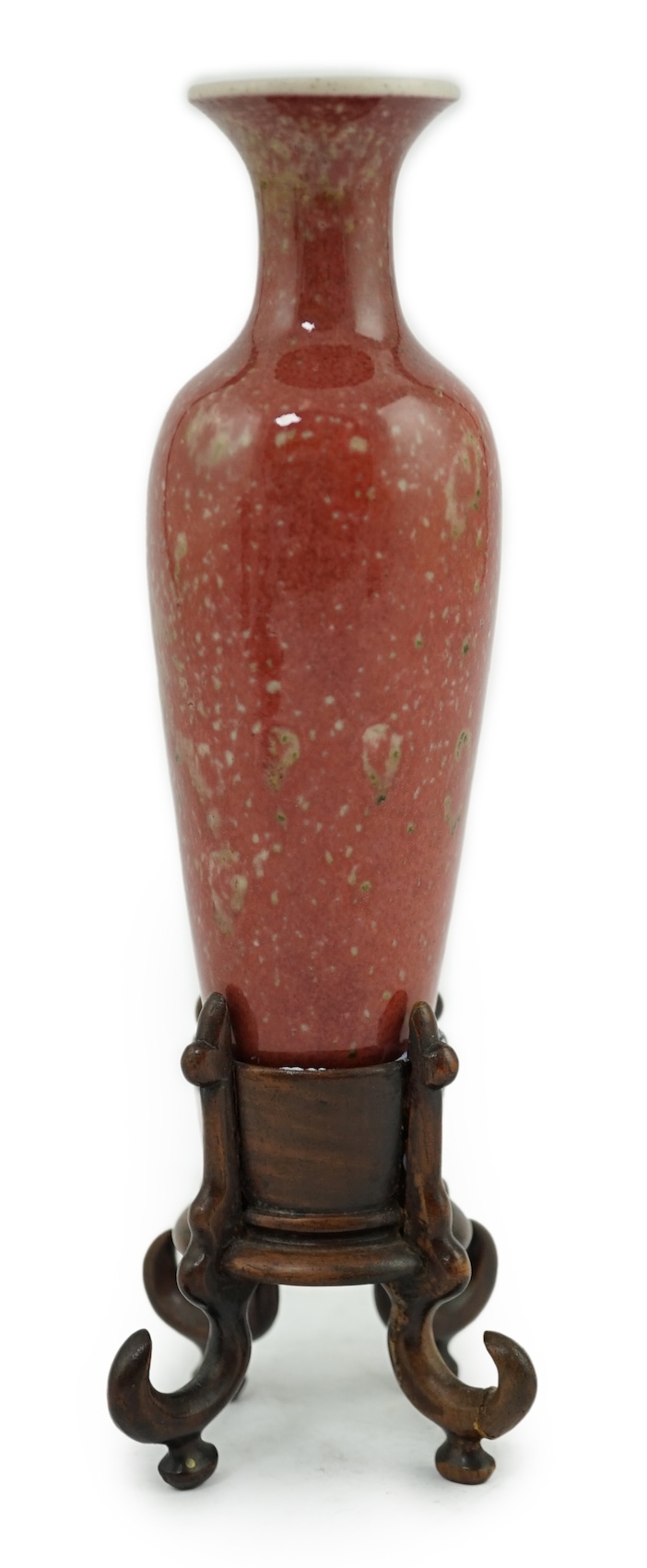 A small Chinese peach bloom glazed vase with fitted wood stand, Republic period